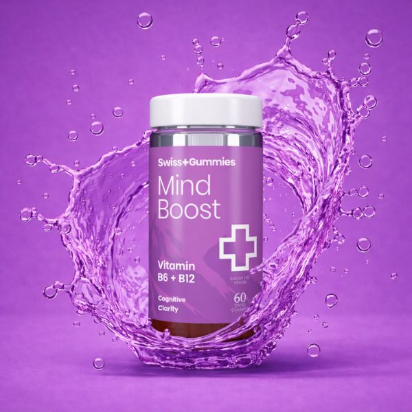 Swiss Gummies Mind Boost supplement bottle with water splash on a purple background